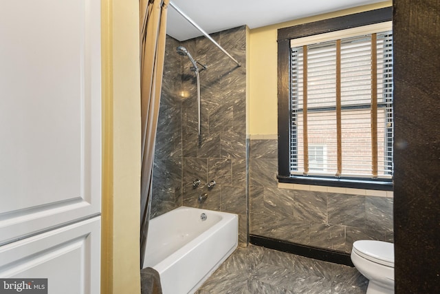 17 W Chase St, Baltimore, MD 21201 - full bath with toilet, bathing tub / shower combination, tile walls, and marble finish floors