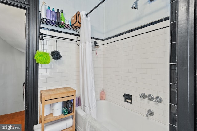 17 W Chase St, Baltimore, MD 21201 - bathroom with shower / bath combo with shower curtain