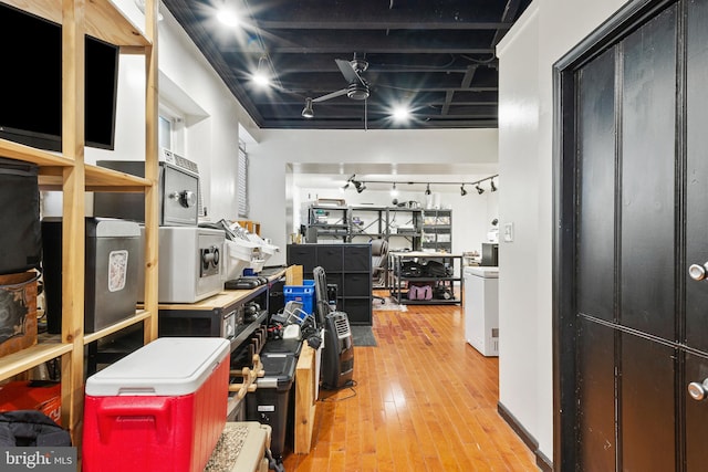 17 W Chase St, Baltimore, MD 21201 - hall with rail lighting and hardwood / wood-style flooring