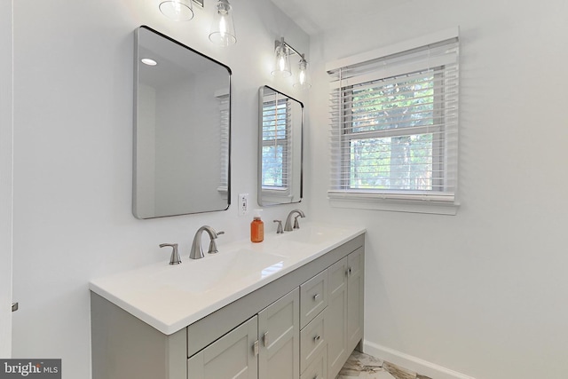 10621 Old Colchester Rd, Lorton, VA 22079 - full bath with double vanity, baseboards, and marble finish flooring