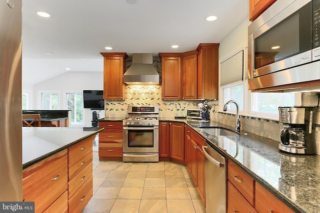 10621 Old Colchester Rd, Lorton, VA 22079 - kitchen featuring wall chimney exhaust hood, appliances with stainless steel finishes, a sink, healthy amount of natural light, and recessed lighting