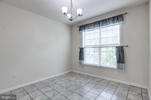 2527 Campus Way N Unit 69, Lanham, MD 20706 - unfurnished room featuring plenty of natural light, a chandelier, baseboards, and light tile patterned flooring