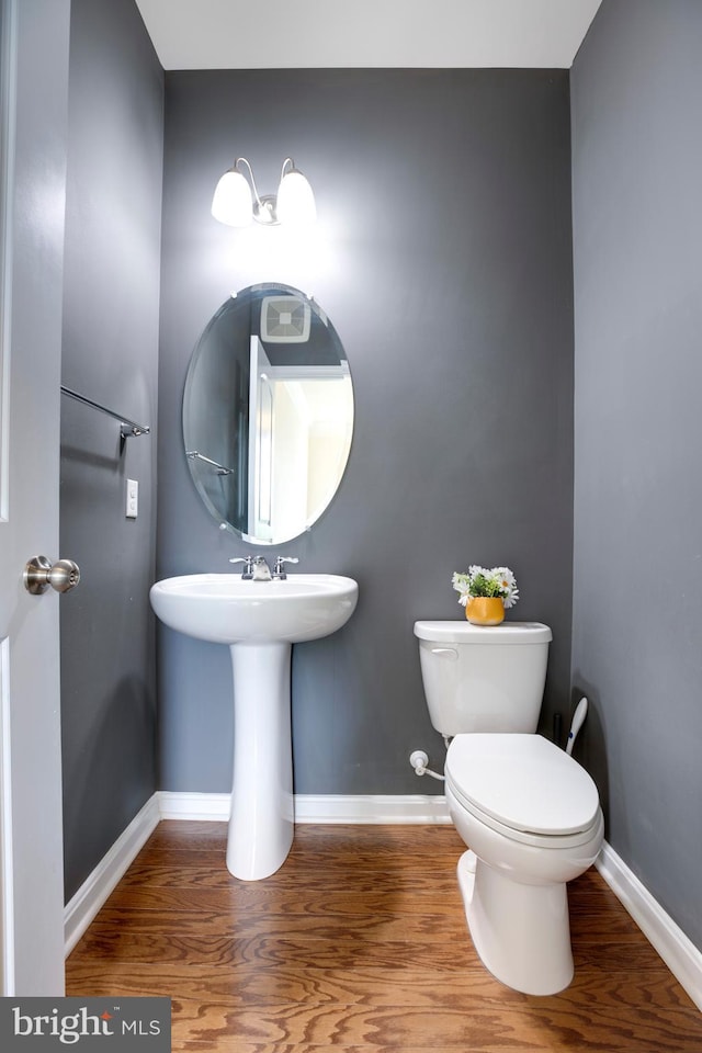 2527 Campus Way N Unit 69, Lanham, MD 20706 - half bathroom with wood finished floors, baseboards, and toilet
