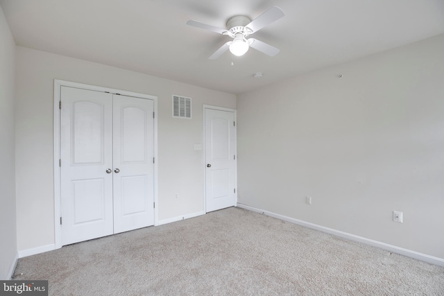 2527 Campus Way N Unit 69, Lanham, MD 20706 - unfurnished bedroom featuring carpet, baseboards, a closet, and a ceiling fan
