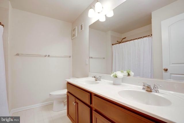 2527 Campus Way N Unit 69, Lanham, MD 20706 - full bath with double vanity, toilet, baseboards, and curtained shower