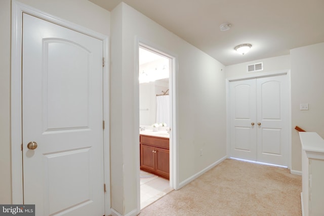 2527 Campus Way N Unit 69, Lanham, MD 20706 - hall with light carpet and baseboards