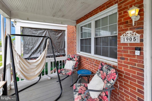 wooden deck featuring a porch
