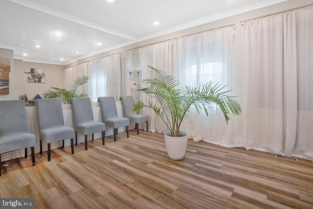 5753 Frederick Douglas Pl, White Plains, MD 20695 - sitting room with ornamental molding, recessed lighting, and wood finished floors
