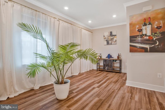 5753 Frederick Douglas Pl, White Plains, MD 20695 - sitting room with ornamental molding, light wood finished floors, baseboards, and recessed lighting