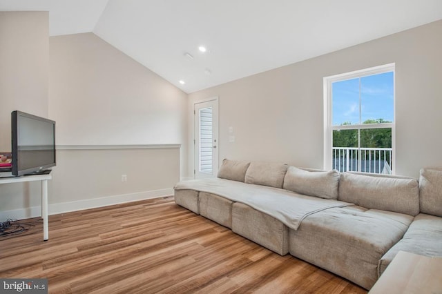 5753 Frederick Douglas Pl, White Plains, MD 20695 - living area with vaulted ceiling, wood finished floors, recessed lighting, and baseboards