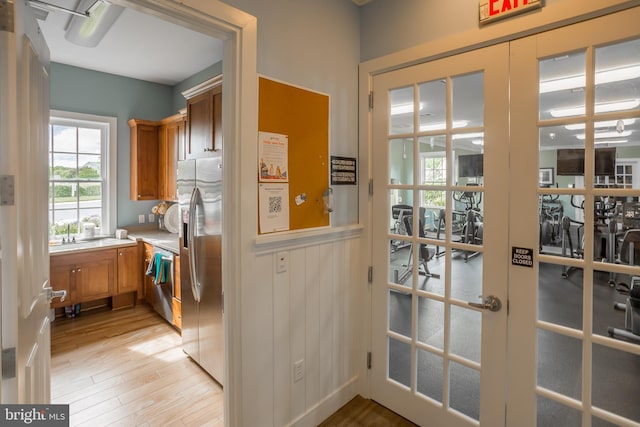 36725 Par Ln Unit 98, Frankford, DE 19945 - entryway with healthy amount of natural light, light wood finished floors, french doors, and a sink