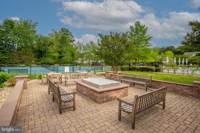 36725 Par Ln Unit 98, Frankford, DE 19945 - view of patio / terrace with a tennis court and fence