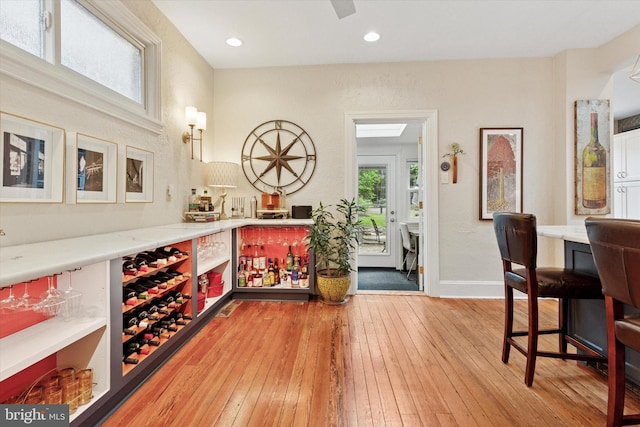 214 E Willow Grove Ave, Philadelphia, PA 19118 - bar area with light wood-style flooring, baseboards, and recessed lighting