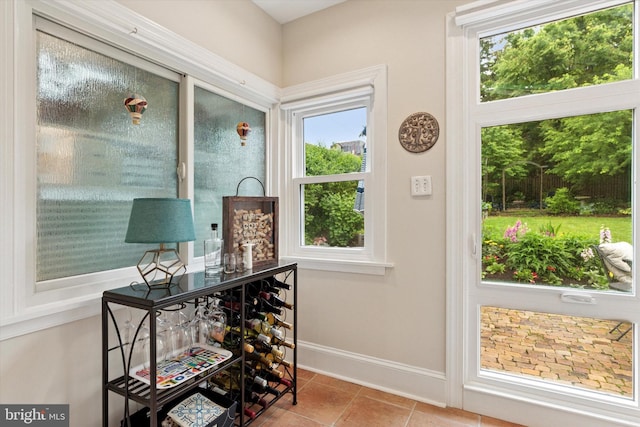 214 E Willow Grove Ave, Philadelphia, PA 19118 - doorway with baseboards and tile patterned floors