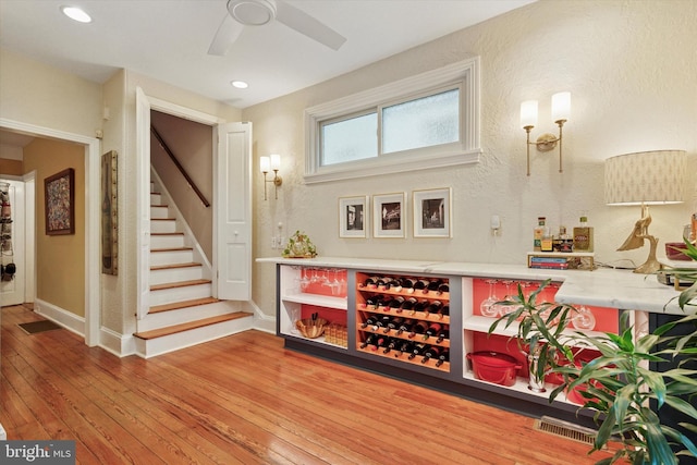 214 E Willow Grove Ave, Philadelphia, PA 19118 - indoor dry bar with stairs, wood-type flooring, a ceiling fan, recessed lighting, and baseboards