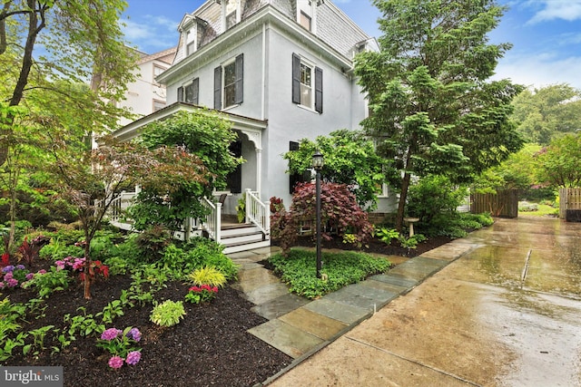 214 E Willow Grove Ave, Philadelphia, PA 19118 - second empire-style home featuring stucco siding and mansard roof