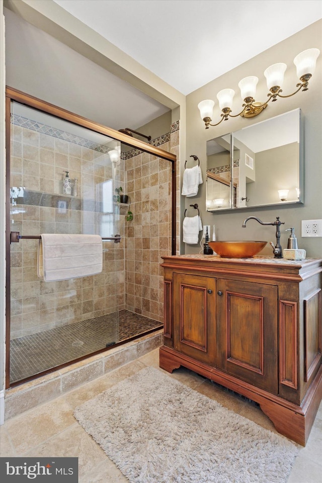214 E Willow Grove Ave, Philadelphia, PA 19118 - full bathroom with a stall shower, vanity, and tile patterned floors