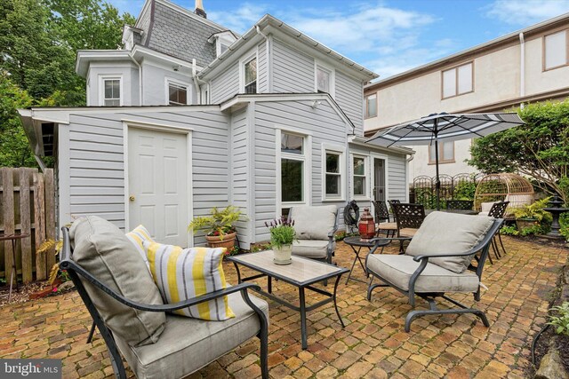 214 E Willow Grove Ave, Philadelphia, PA 19118 - back of house with fence, a patio, and an outdoor living space