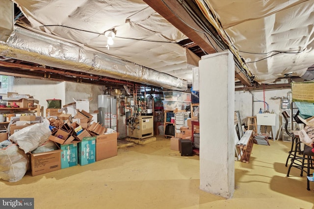 214 E Willow Grove Ave, Philadelphia, PA 19118 - unfinished below grade area featuring gas water heater, a sink, and a heating unit