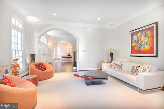 7845 Montvale Way, Mclean, VA 22102 - living area with arched walkways, ornamental molding, plenty of natural light, recessed lighting, and wood finished floors