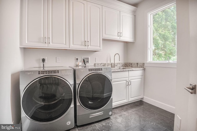 7845 Montvale Way, Mclean, VA 22102 - laundry room with washer and dryer, cabinet space, and baseboards