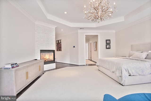 7845 Montvale Way, Mclean, VA 22102 - bedroom featuring a tray ceiling, a chandelier, recessed lighting, a fireplace, and ornamental molding