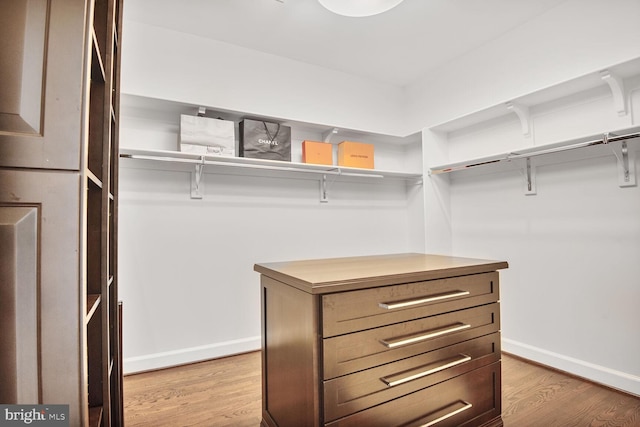 7845 Montvale Way, Mclean, VA 22102 - walk in closet with light wood-style floors