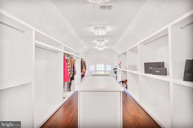 7845 Montvale Way, Mclean, VA 22102 - walk in closet with dark wood finished floors, a chandelier, and vaulted ceiling