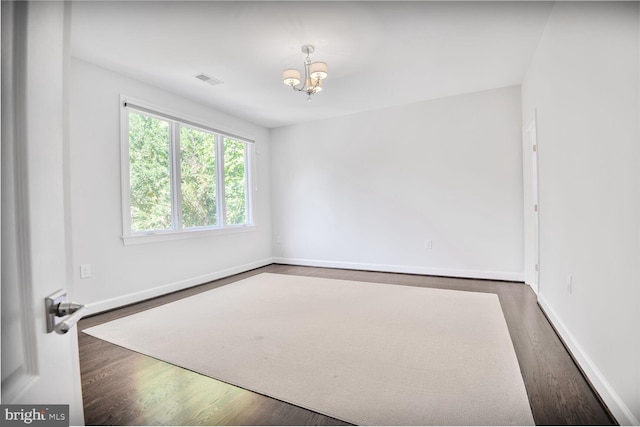 7845 Montvale Way, Mclean, VA 22102 - empty room with a chandelier, baseboards, and dark wood-style floors