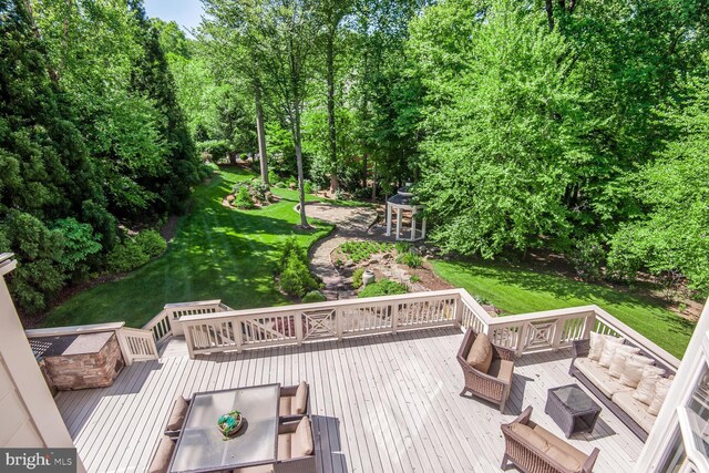 7845 Montvale Way, Mclean, VA 22102 - wooden deck featuring a yard and view of wooded area