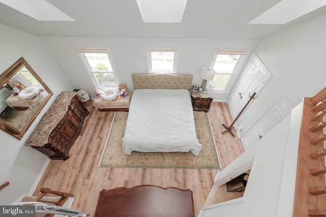 6005 Southward Way, Alexandria, VA 22315 - bedroom with a skylight and wood finished floors