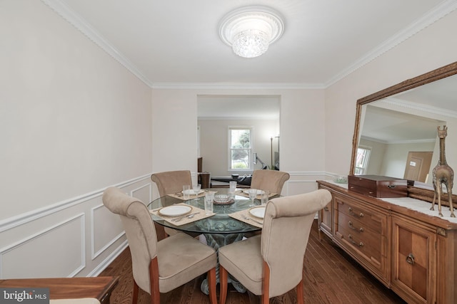 6005 Southward Way, Alexandria, VA 22315 - dining area featuring dark wood finished floors, crown molding, a decorative wall, wainscoting, and a chandelier