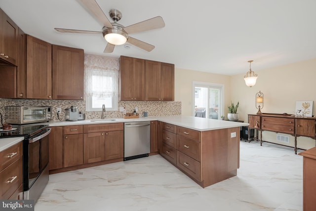 6005 Southward Way, Alexandria, VA 22315 - kitchen with dishwasher, electric range, a peninsula, tasteful backsplash, and plenty of natural light