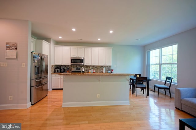 36 Crows Nest Ct, Mount Laurel, NJ 08054 - kitchen with appliances with stainless steel finishes, backsplash, white cabinets, light wood-style floors, and recessed lighting