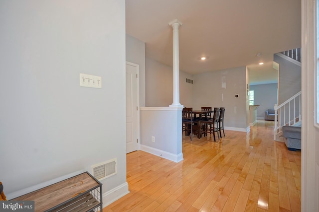 36 Crows Nest Ct, Mount Laurel, NJ 08054 - dining room with light wood-style floors, ornate columns, baseboards, recessed lighting, and stairway