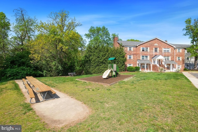 4425 Romlon St Unit 103, Beltsville, MD 20705 - view of community featuring a playground and a yard
