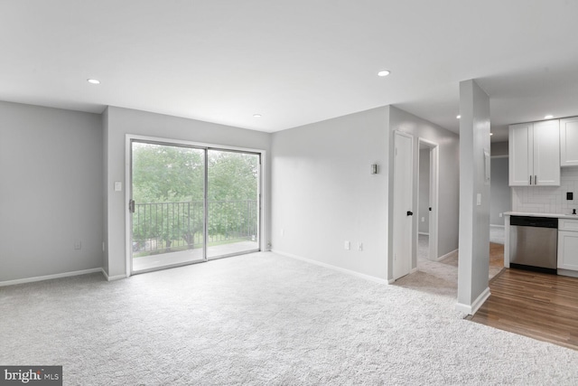 4425 Romlon St Unit 103, Beltsville, MD 20705 - unfurnished living room with carpet floors, baseboards, and recessed lighting