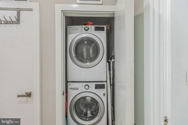 2812 Georgia Ave NW Unit 6, Washington, DC 20001 - clothes washing area with stacked washer and clothes dryer