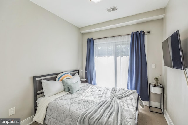 2812 Georgia Ave NW Unit 6, Washington, DC 20001 - bedroom featuring wood finished floors and baseboards