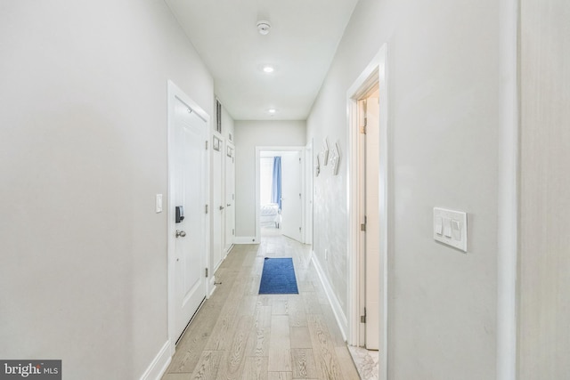 2812 Georgia Ave NW Unit 6, Washington, DC 20001 - hallway with light wood-style flooring and baseboards