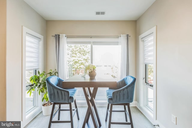 2812 Georgia Ave NW Unit 6, Washington, DC 20001 - dining area featuring healthy amount of natural light and wood finished floors
