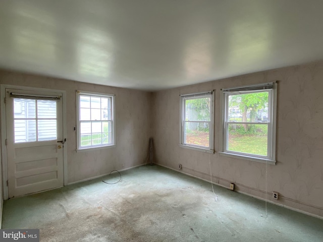 interior space featuring baseboards
