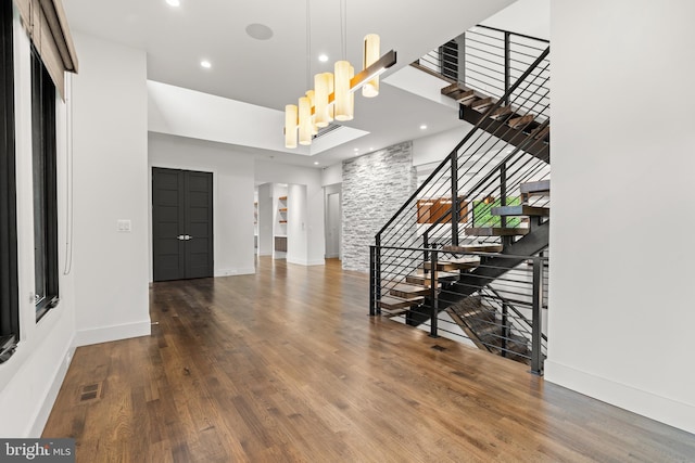 3546 N Utah St, Arlington, VA 22207 - foyer entrance featuring wood finished floors, recessed lighting, stairs, and baseboards