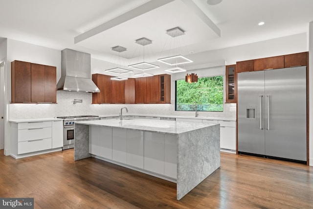 3546 N Utah St, Arlington, VA 22207 - kitchen with premium appliances, wall chimney range hood, modern cabinets, decorative backsplash, and recessed lighting