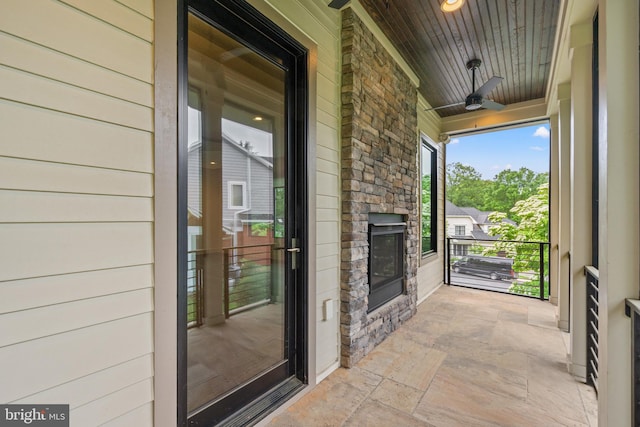 3546 N Utah St, Arlington, VA 22207 - view of exterior entry featuring stone siding and a ceiling fan