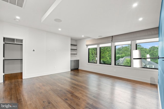 3546 N Utah St, Arlington, VA 22207 - unfurnished living room featuring healthy amount of natural light, wood finished floors, baseboards, and recessed lighting
