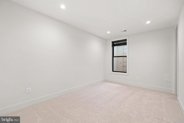 3546 N Utah St, Arlington, VA 22207 - spare room with recessed lighting, light colored carpet, and baseboards