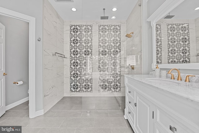 full bath with walk in shower, recessed lighting, vanity, tile patterned flooring, and baseboards