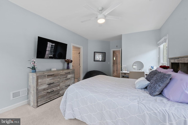 bedroom featuring carpet floors, a ceiling fan, and baseboards