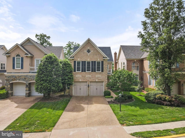 view of front of house featuring an attached garage, driveway, stone siding, and a front lawn